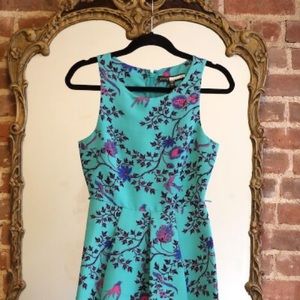 Teal dress with floral and bird design